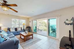 Beachfront corner condo with pool and hot tub easy access to dining