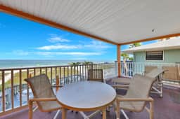 Oceanfront condo with WiFi pool and views walk to dining and attractions