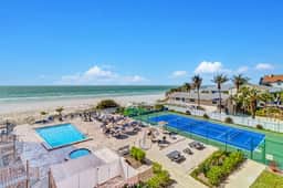 Waterfront condo with pool hot tub tennis and beach access