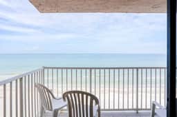 Delightful waterfront condo with sweeping views beach access balcony and pool