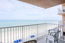 Delightful waterfront condo with sweeping views beach access balcony and pool