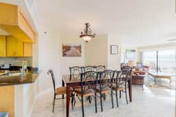 Sunny beachfront condo with pool access to beach attractions