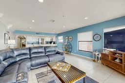 Coastal condo with sweeping Gulf views and wraparound balcony dogs welcome