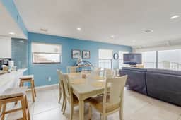 Coastal condo with sweeping Gulf views and wraparound balcony dogs welcome