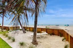 Gulf front condo top floor beach access full kitchen and central AC