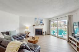Modern cottage with peek a boo side Gulf view and beachfront heated pool and spa
