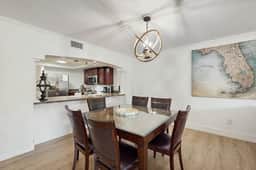 Modern cottage with peek a boo side Gulf view and beachfront heated pool and spa