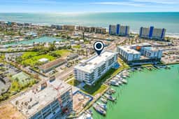 Brand new condo steps to beach with balcony heated pool and hot tub dog friendly