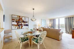 Waterfront condo with pool and spa directly across from wide beach