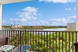 Waterfront condo with pool and spa directly across from wide beach