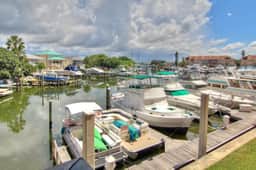 Intracoastal view condo with pool hot tub and marina access walk to beach