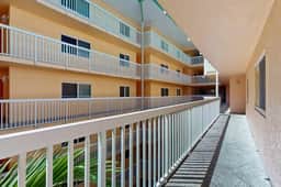 Beachfront condo with balcony pool hot tub grill and AC