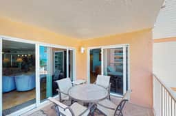 Beachfront condo with balcony pool hot tub grill and AC