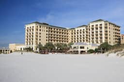 Exclusive Sandpearl Residences condo with Gulf views heated pool spa grills
