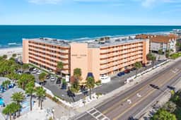 Dog friendly beachfront condo with pool hot tub tennis and AC snowbird friendly