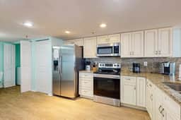Seashore getaway with partial Gulf view and beachfront heated pool and spa