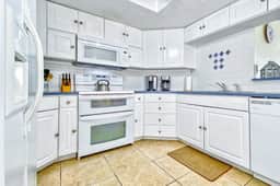 Beachfront coastal condo with private balcony WD on site pool and grills