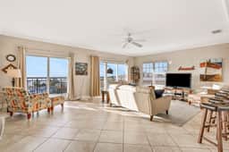 Top floor condo near the beach with pool hot tub washer dryer