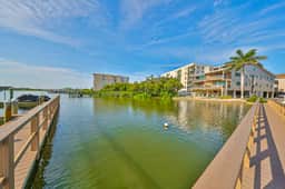 Spacious and family friendly with pool dock and just steps to the beaches