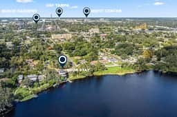 Sprawling river view estate with game room dock kayaks grill and fishing gear - Image 2