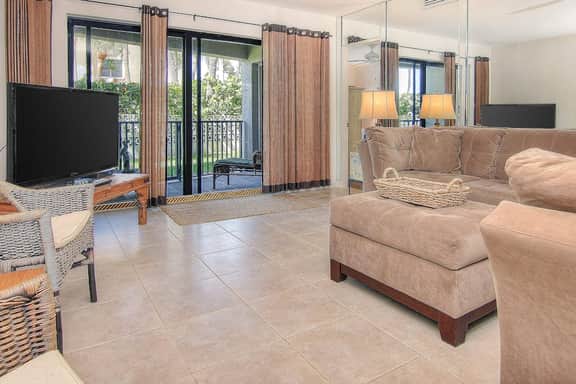 Elegant 1st floor condo w private patio AC on site outdoor pool and gas grills