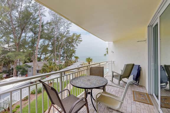 Gulf front steps to the beach snowbird and family friendly pool AC and WIFI