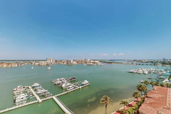 Luxury stunning waterfront condo Central AC pool snowbird friendly
