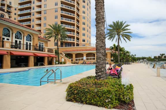 Luxury stunning waterfront condo Central AC pool snowbird friendly