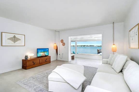 Waterfront home with deck garden WiFi and central AC dog friendly