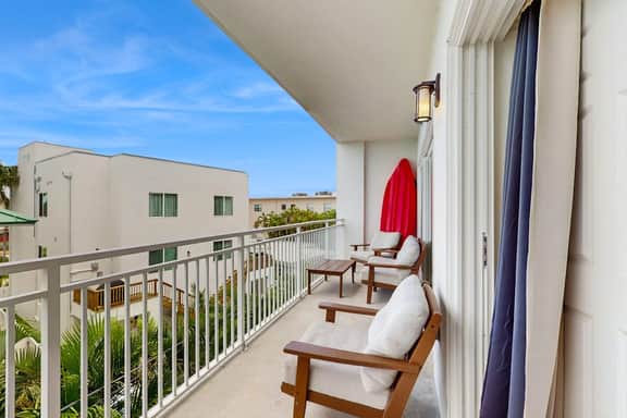 Beach chic condo across from beach close to John s Pass on site pool dogs ok