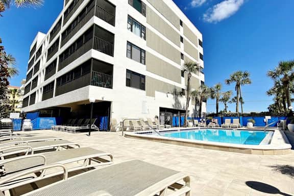 Peaceful Beachfront Escape w/Private Balcony, Heated pool & Spa