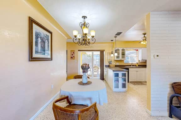 Single story home near beach with heated private pool enclosed yard Dogs ok