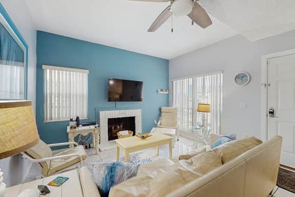Water view condo with balcony grill heated pool hot tub and sauna walk to beach