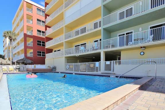 Oceanfront condo with heated pool hot tub and grills