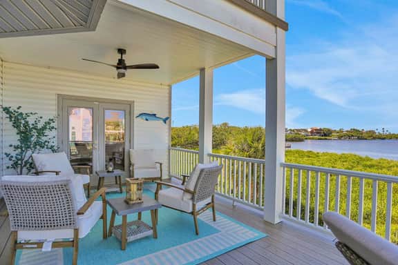 Luxurious waterfront home with pool game room dock