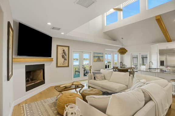 Luxurious waterfront home with pool game room dock
