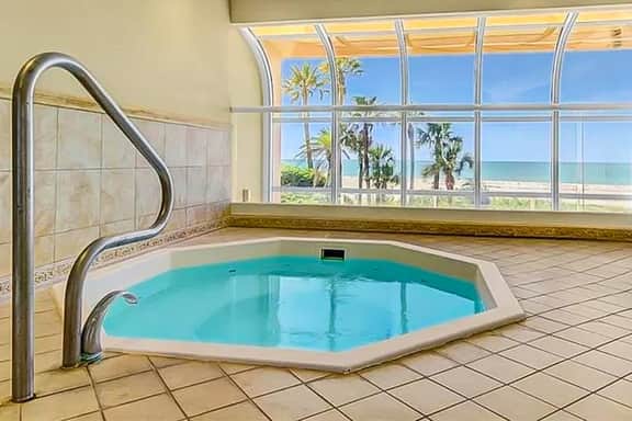 Luxe penthouse with balcony sweeping views heated pool spa hot tub and gym