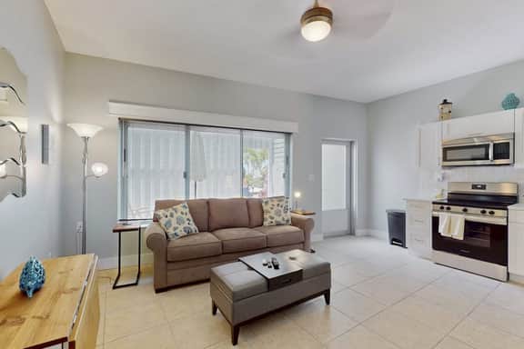 Enchanting condo with full kitchen enclosed yard and washer dryer