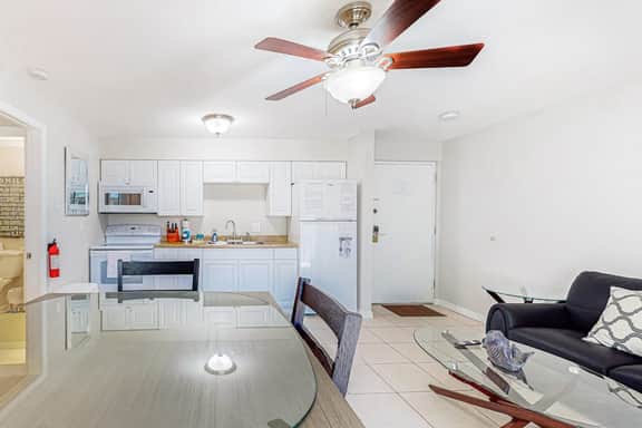 Centrally located condo with heated pool balcony washer dryer and central AC