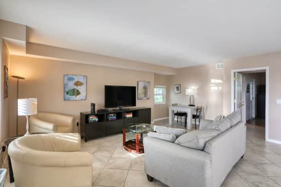 Third floor condo with pool access fast WiFi central AC and WD snowbirds OK