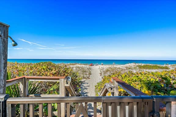 Gorgeous updated and spacious condo with stunning beachfront view pool WD and AC