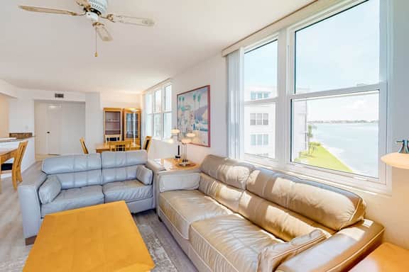 Water view condo with private beach pool and hot tub snowbird friendly