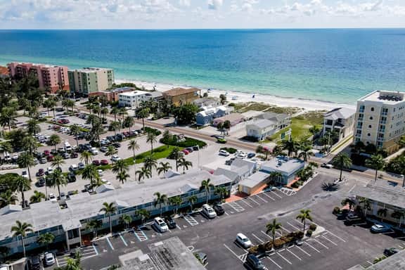 1st floor condo with private dock easy beach access heated pool and patio