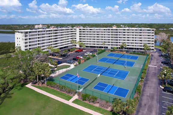 Elegant condo with water view near beach pool and hot tub fast WiFi and AC