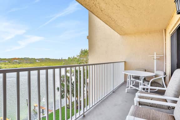 Elegant condo with water view near beach pool and hot tub fast WiFi and AC