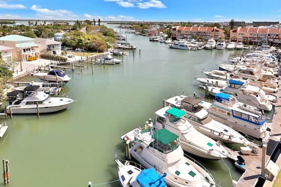 Bay front condo shared pool and hot tub right next to the beach