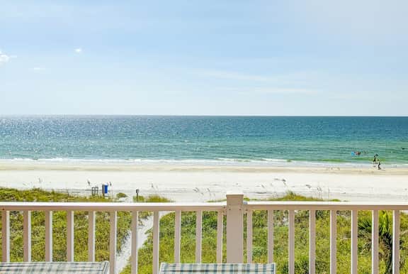 Beautiful oceanfront condo on the beach with pool and WiFi walk to restaurants
