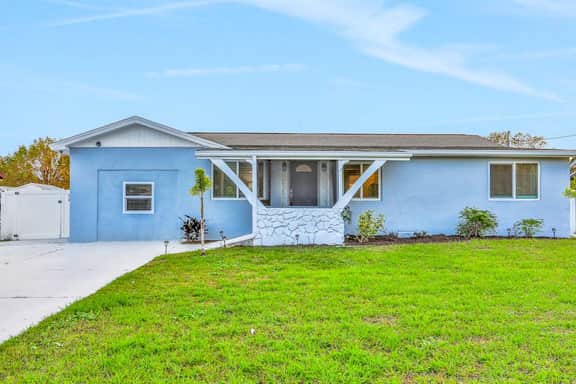 Dog friendly tropical stay with a private pool grill game tables and central AC