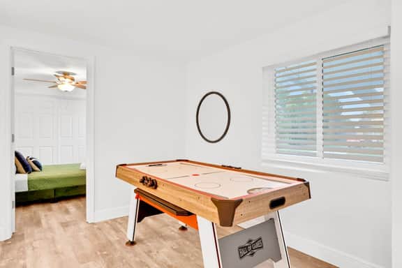 Dog friendly tropical stay with a private pool grill game tables and central AC