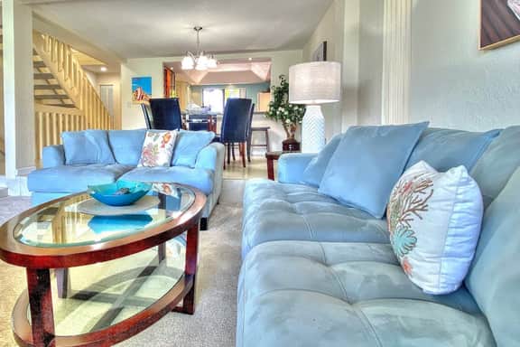 Coastal condo with multiple balconies and dock intracoastal waterway views